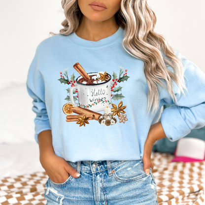 Light blue sweatshirt with winter-themed design worn by a person.