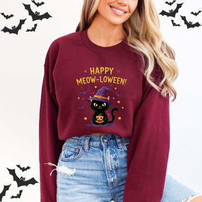 Person wearing a maroon sweatshirt with a Halloween design featuring a black cat and text, standing against a white background with bats  Above the cat, the text reads, "HAPPY MEOW-LOWEEN!"