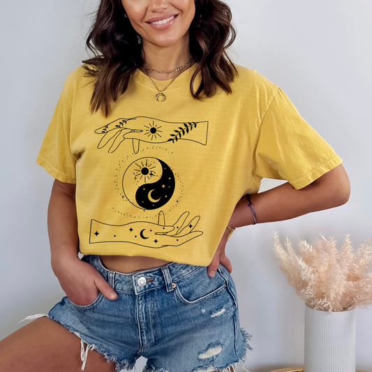 Hands with Sun and Moon, Day and Night Yin Yang with Sparkling Spiral Galaxy
